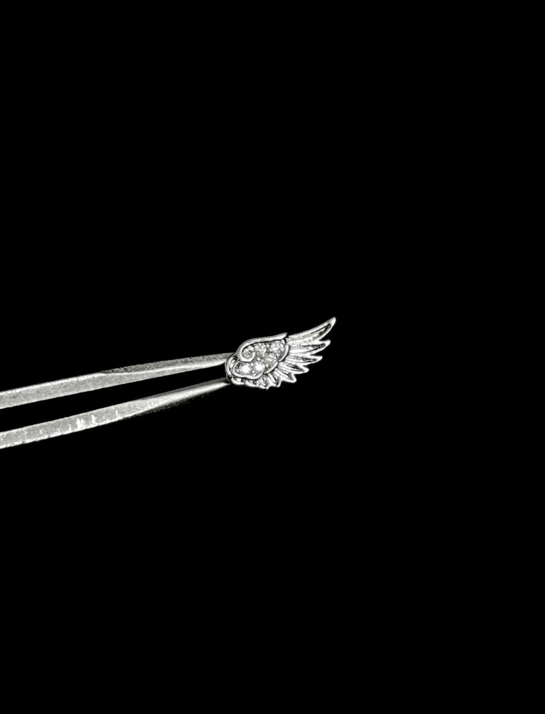 Devoted Wings Triple Lobe Earring Stack