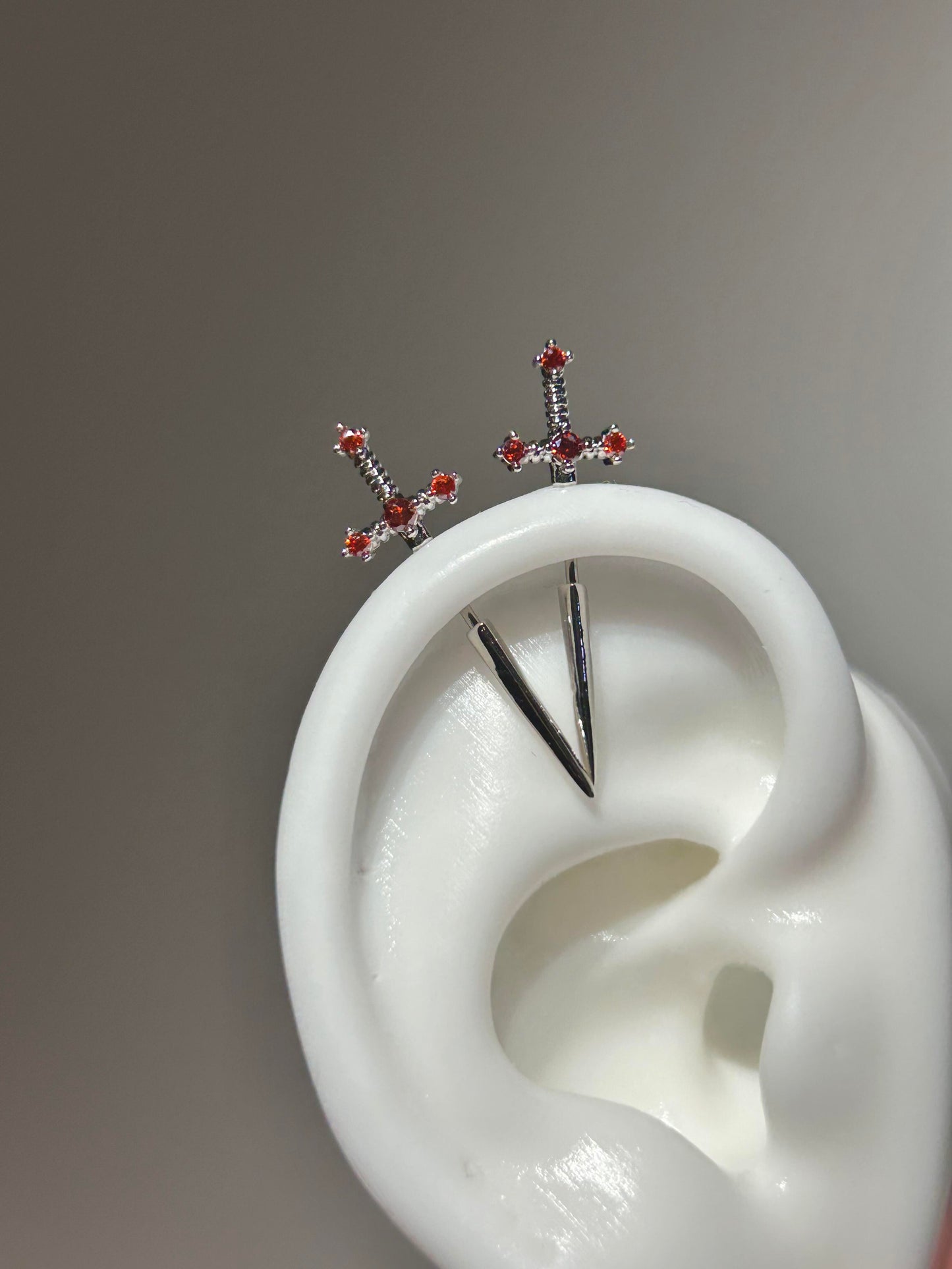 Crystal sword vertical helix earrings