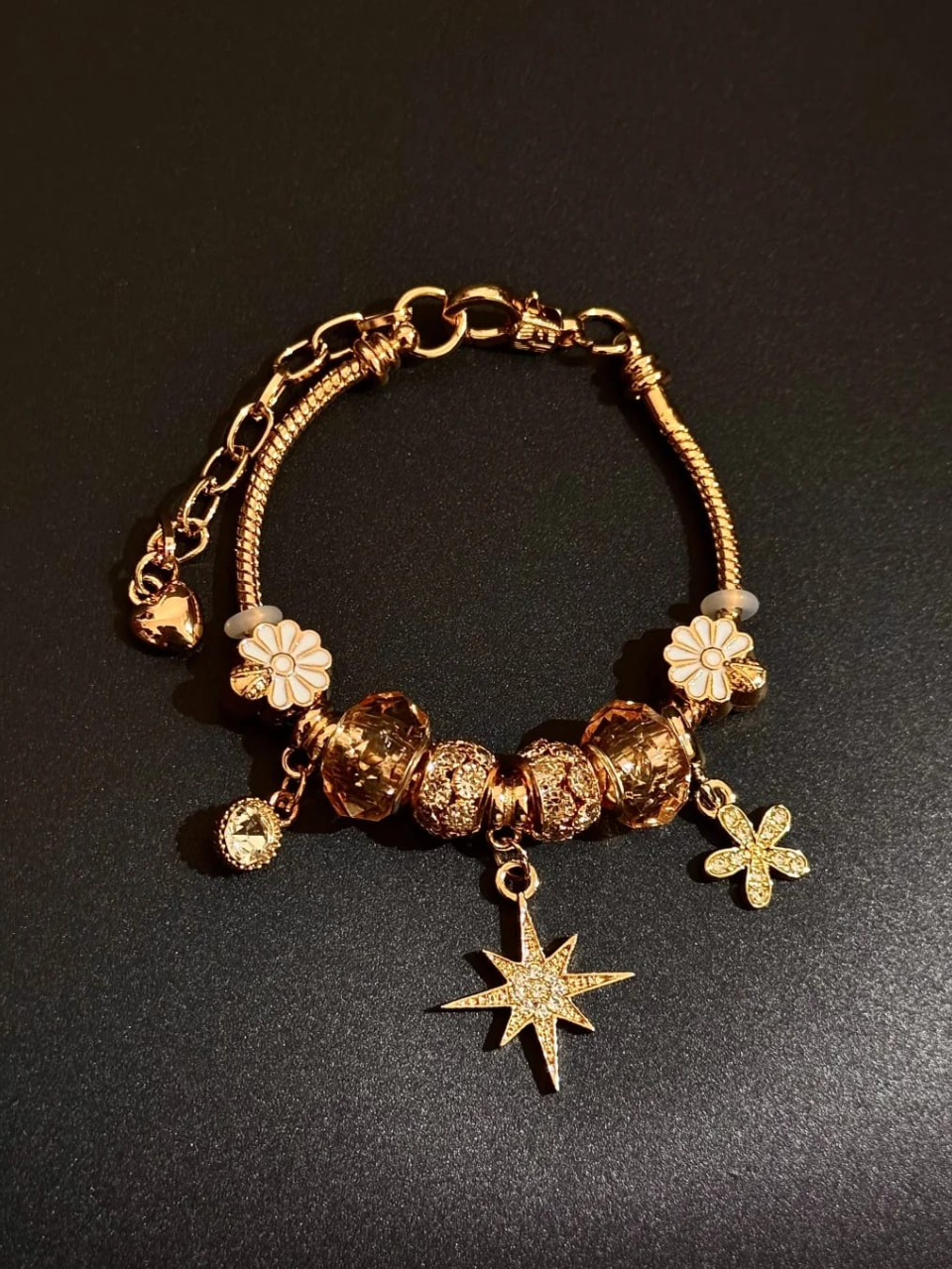 Gold Starburst and Flower Charm Bracelet