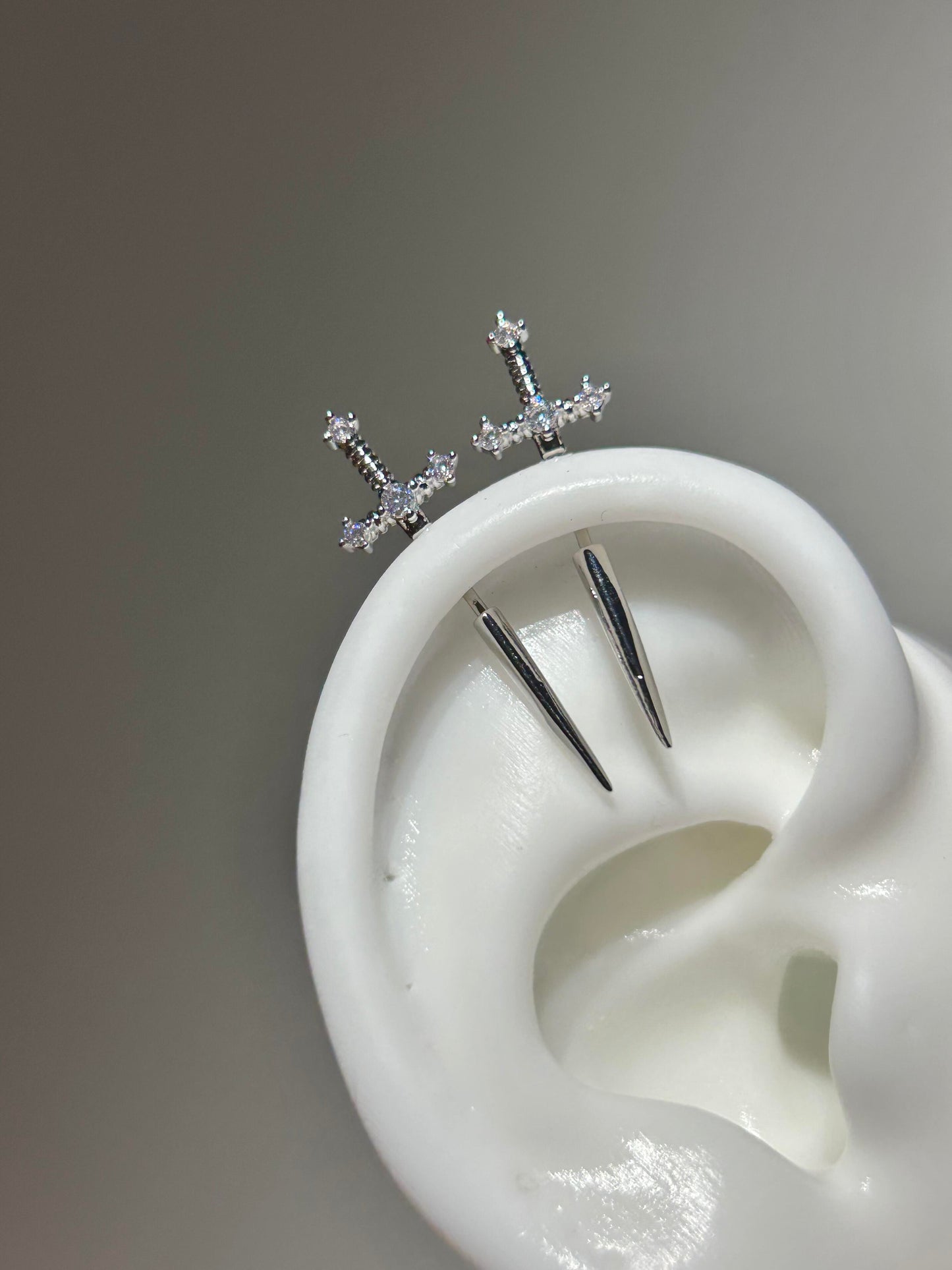 Crystal sword vertical helix earrings