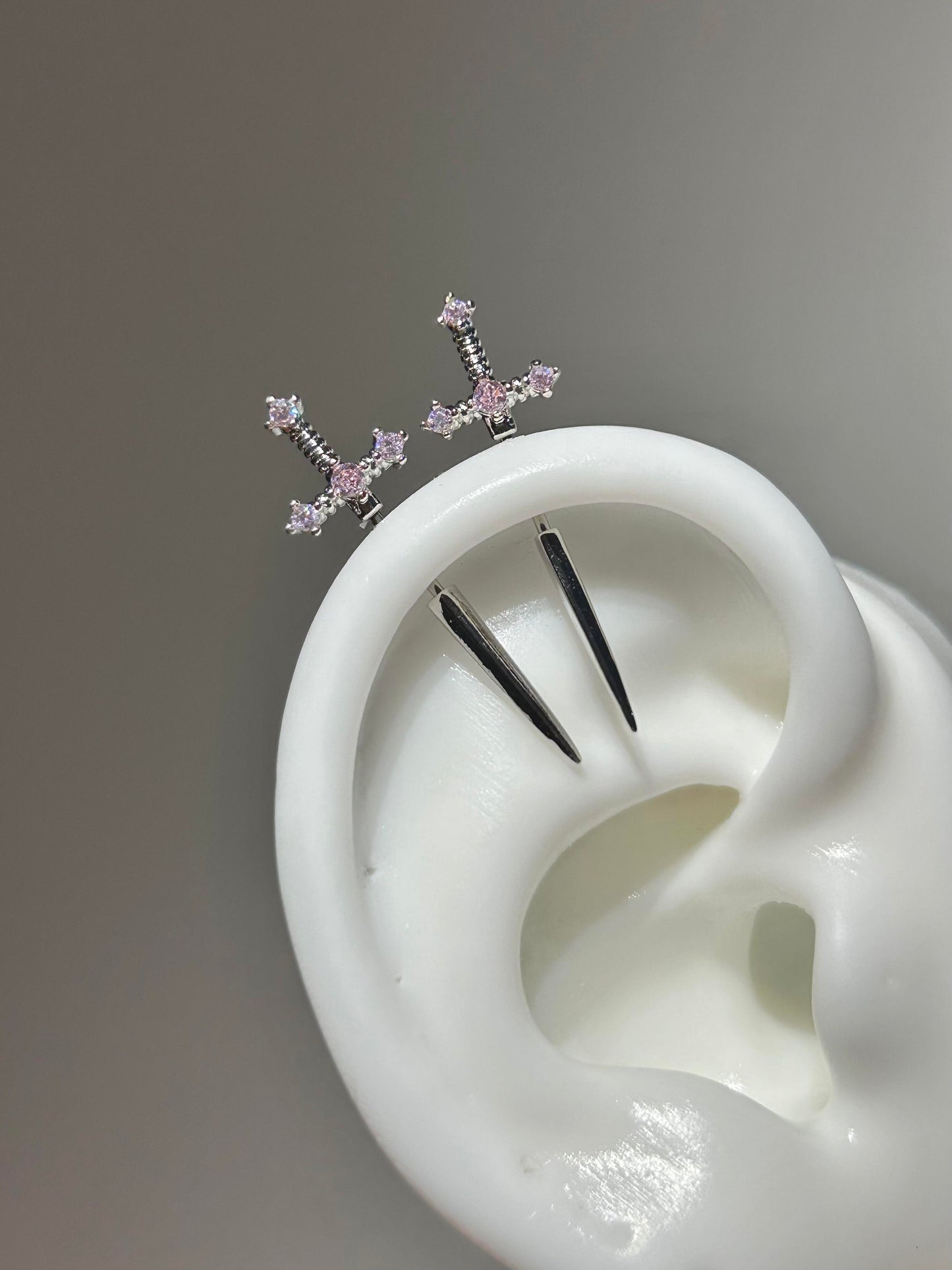 Crystal sword vertical helix earrings