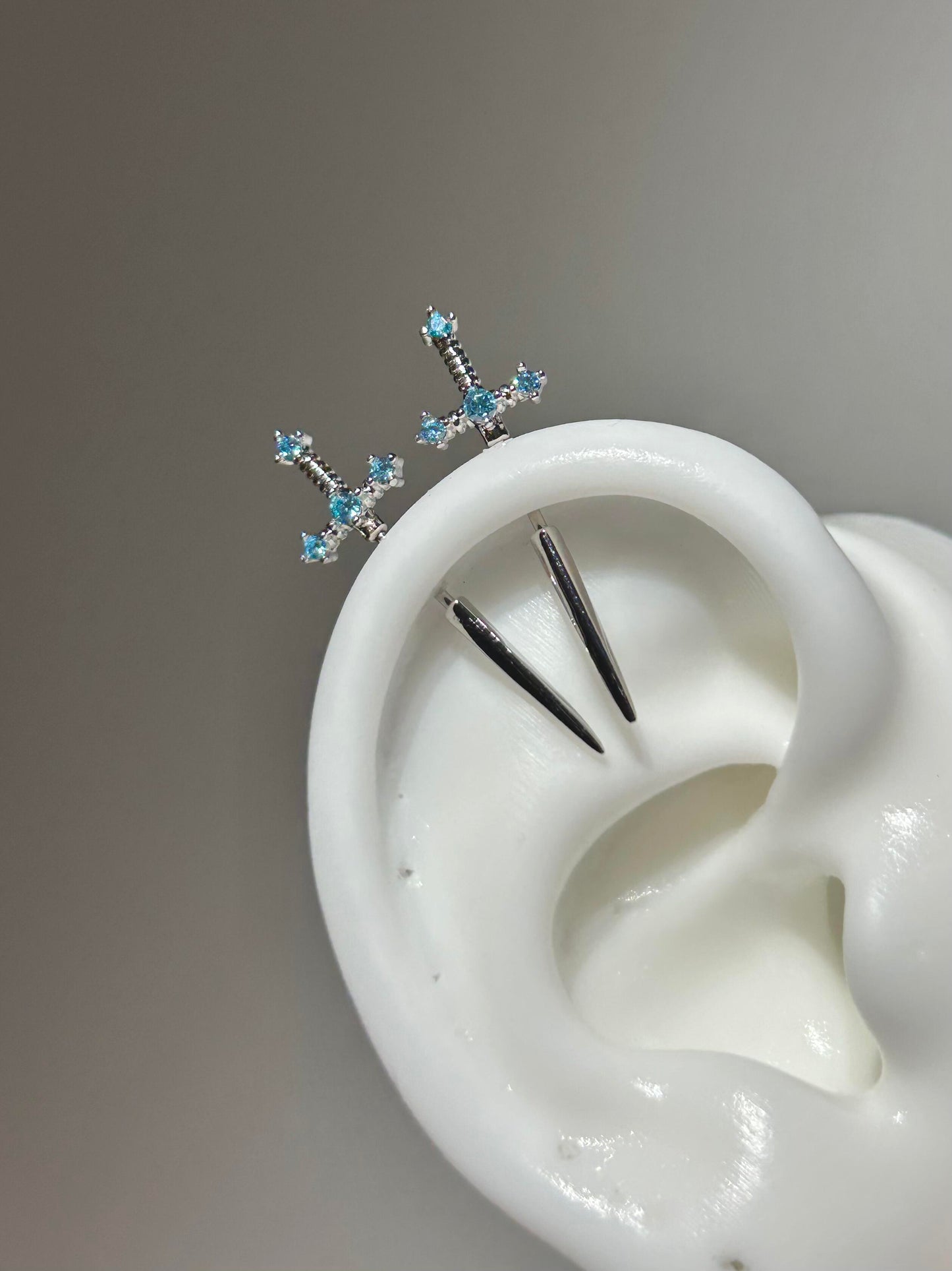 Crystal sword vertical helix earrings