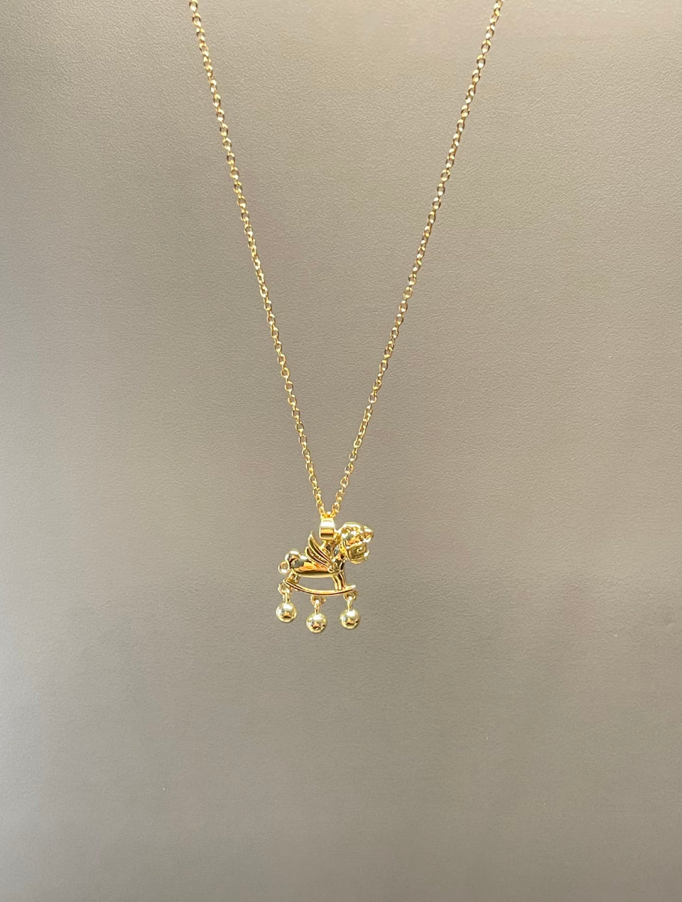 Gold Winged Rocking Horse Necklace