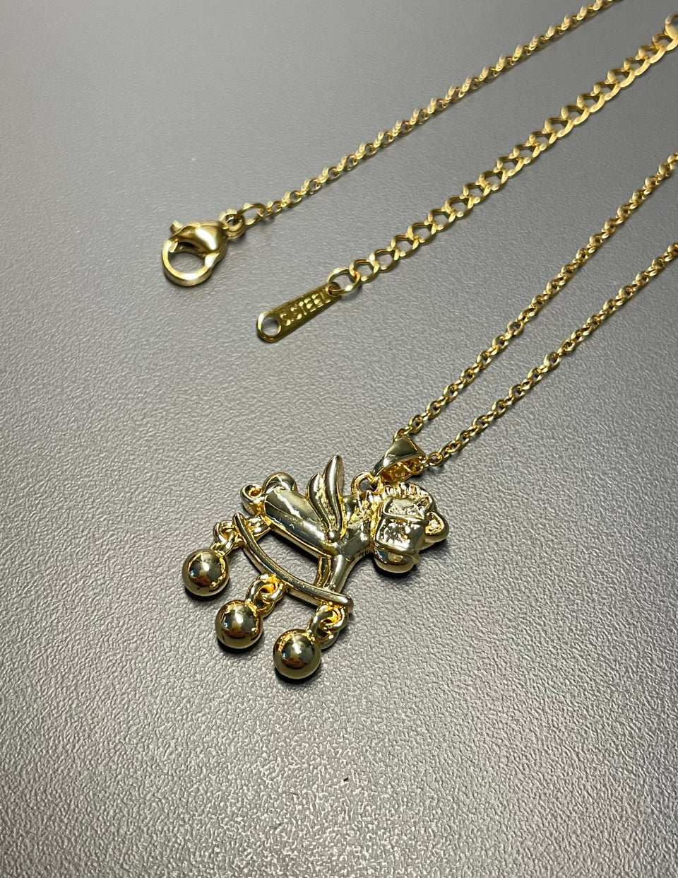 Gold Winged Rocking Horse Necklace