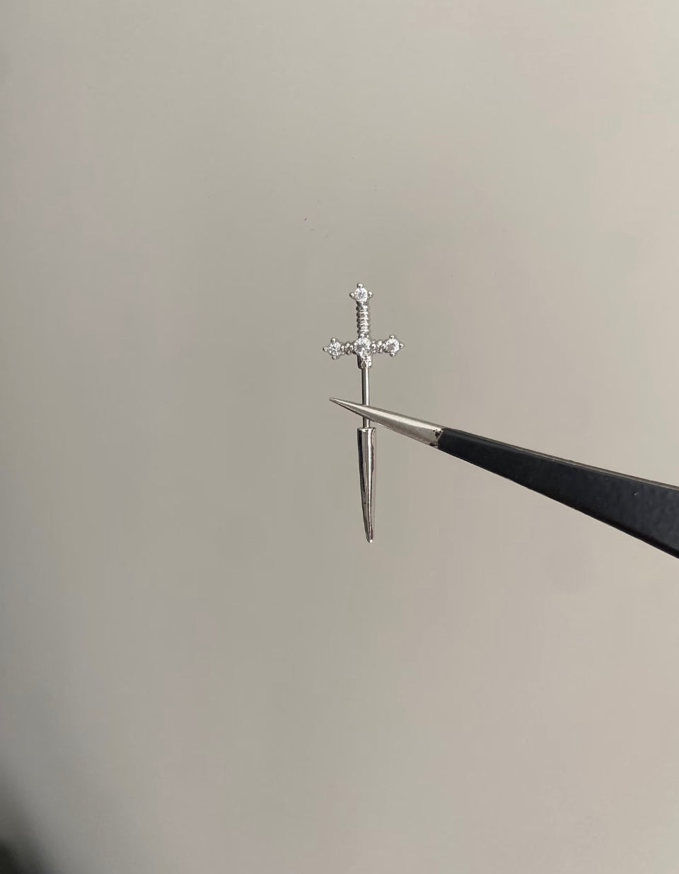 Crystal sword vertical helix earrings