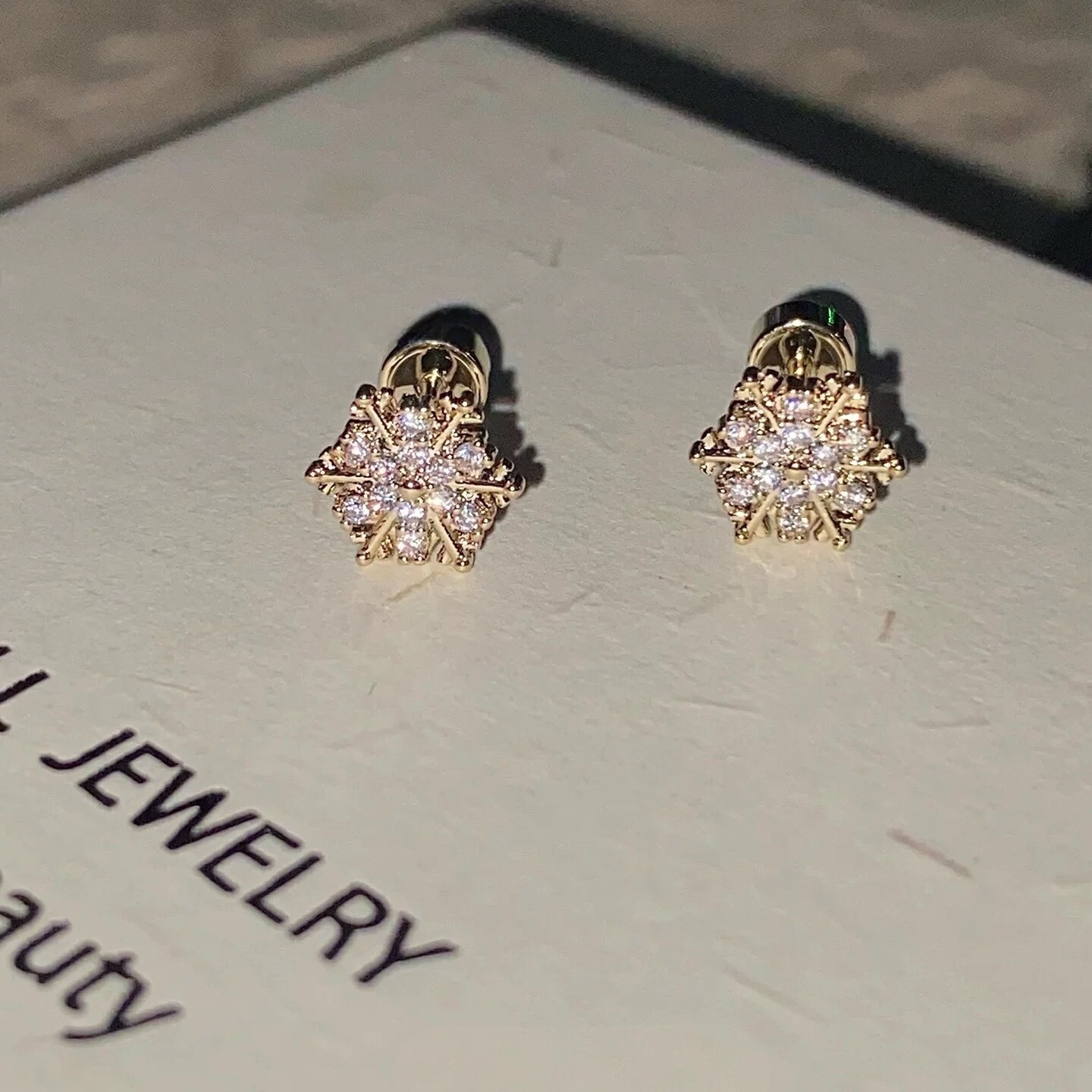 Champagne Gold Snowflake Studs.