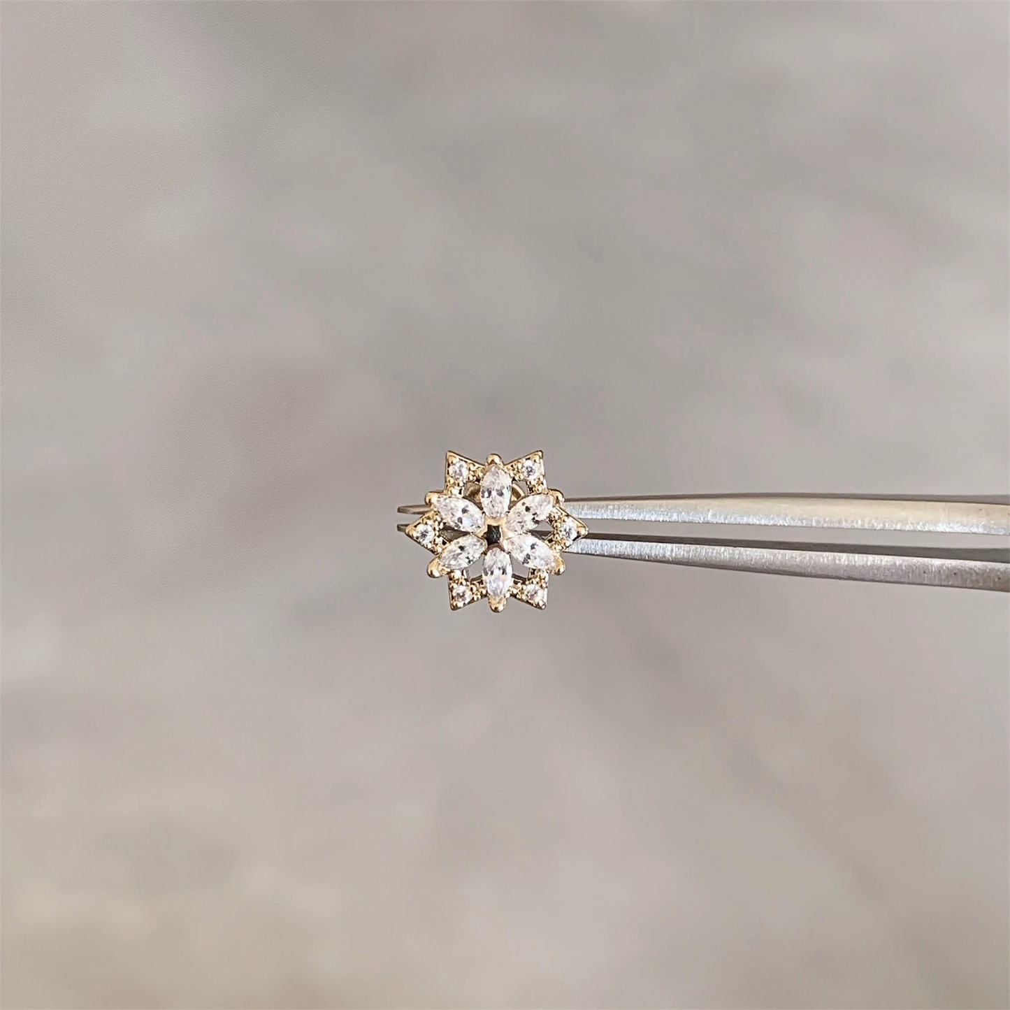 Gold Shimmering Flower Helix Stud