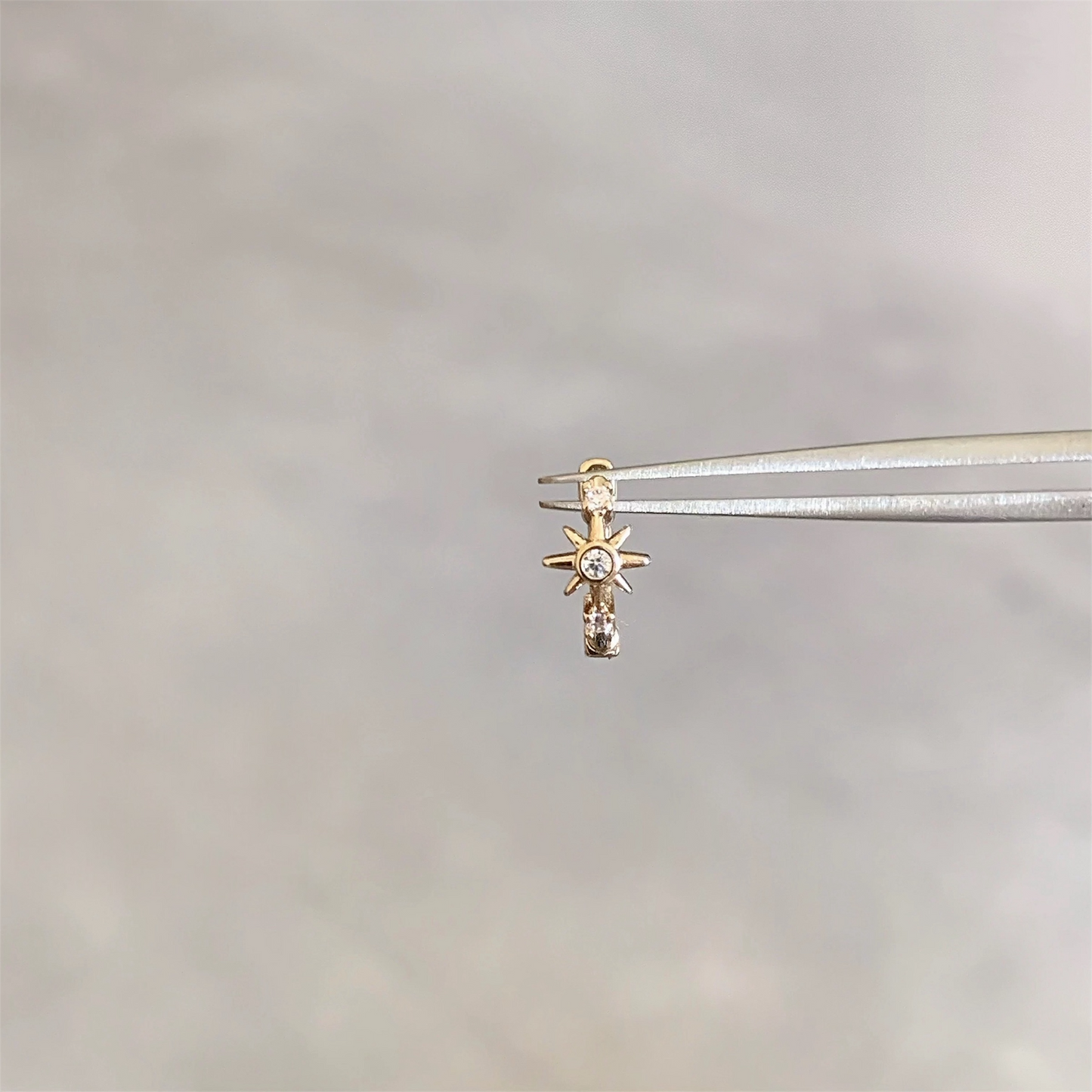 Gold Shining Star Helix Piercing