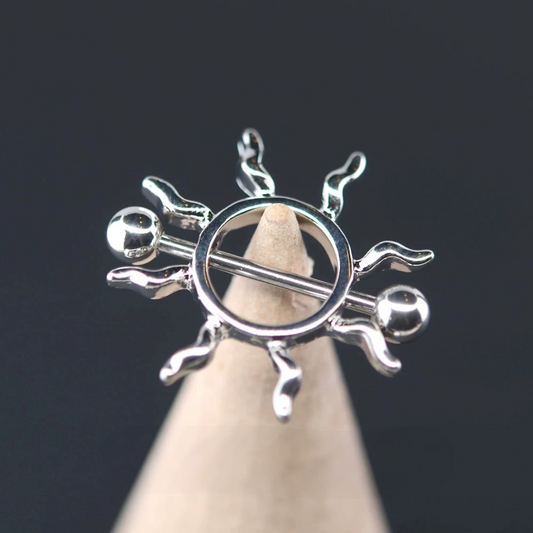 Silver Sunburst Nipple Piercing