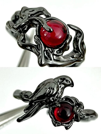 Obsidian Bird on Ruby Nest Ring