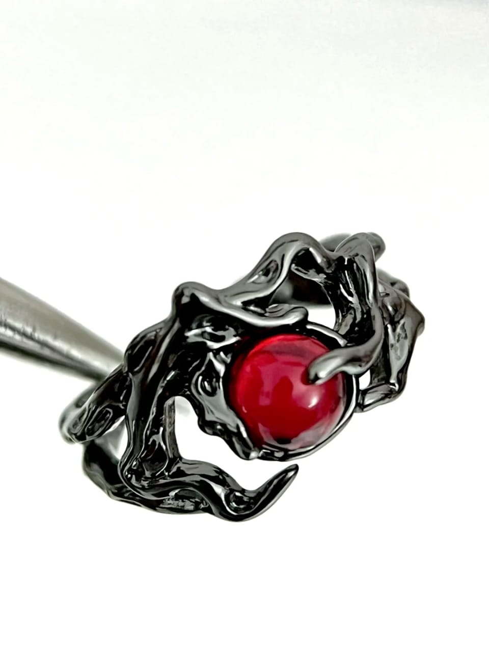 Obsidian Bird on Ruby Nest Ring