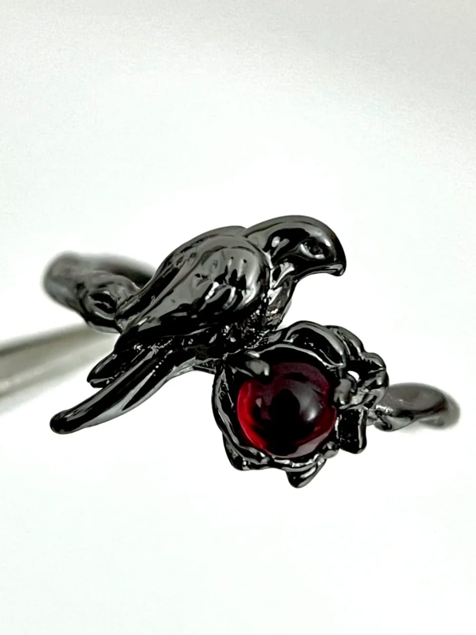 Obsidian Bird on Ruby Nest Ring