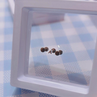 Silver Stud Tripple Lobe Piercing