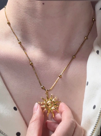 Gold Spiral Sunflare Necklace