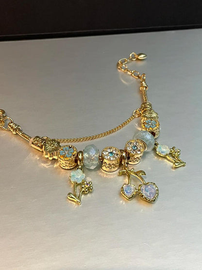 Shimmering Cherry Blossom Charm Bracelet